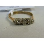 An 18ct gold five stone, claw set diamon