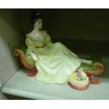 A Royal Doulton china figure 'At Ease'