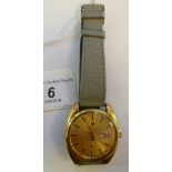 A Tissot Seastar yellow metal cased auto