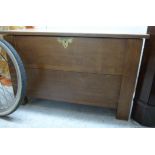 A mid 20thC stained oak chest, the top o