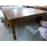 A modern waxed pine dining table, the re