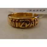 An 18ct gold Mizpah ring 11
