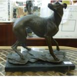 A cast and patinated bronze model greyho