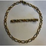 A bi-coloured 9ct gold necklace, compris