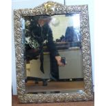 A late Victorian bevelled mirror, set in