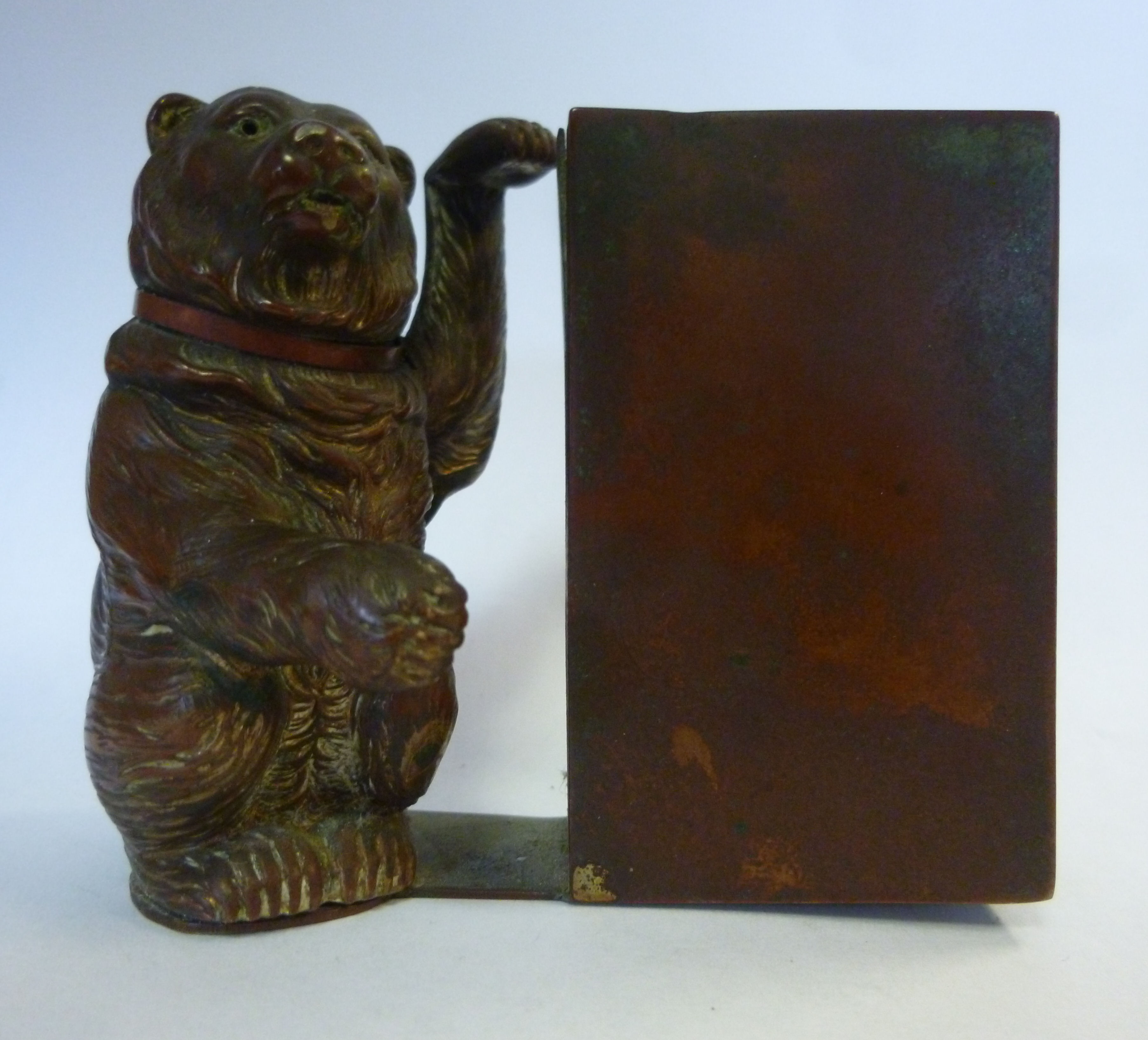 An early 20thC cast and patinated copper