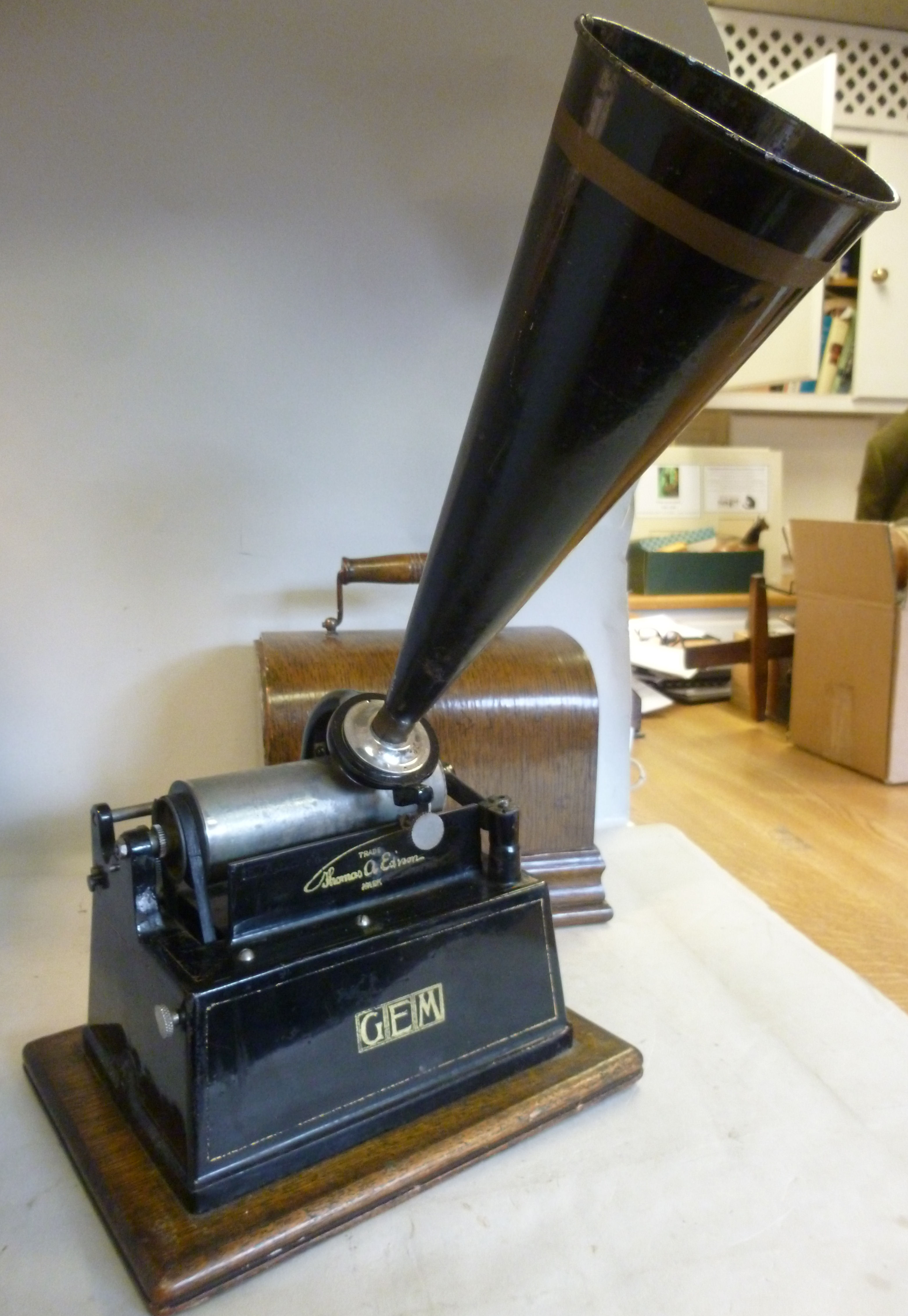 An Edison Gem Phonograph, under a lamina