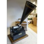 An Edison Gem Phonograph, under a lamina