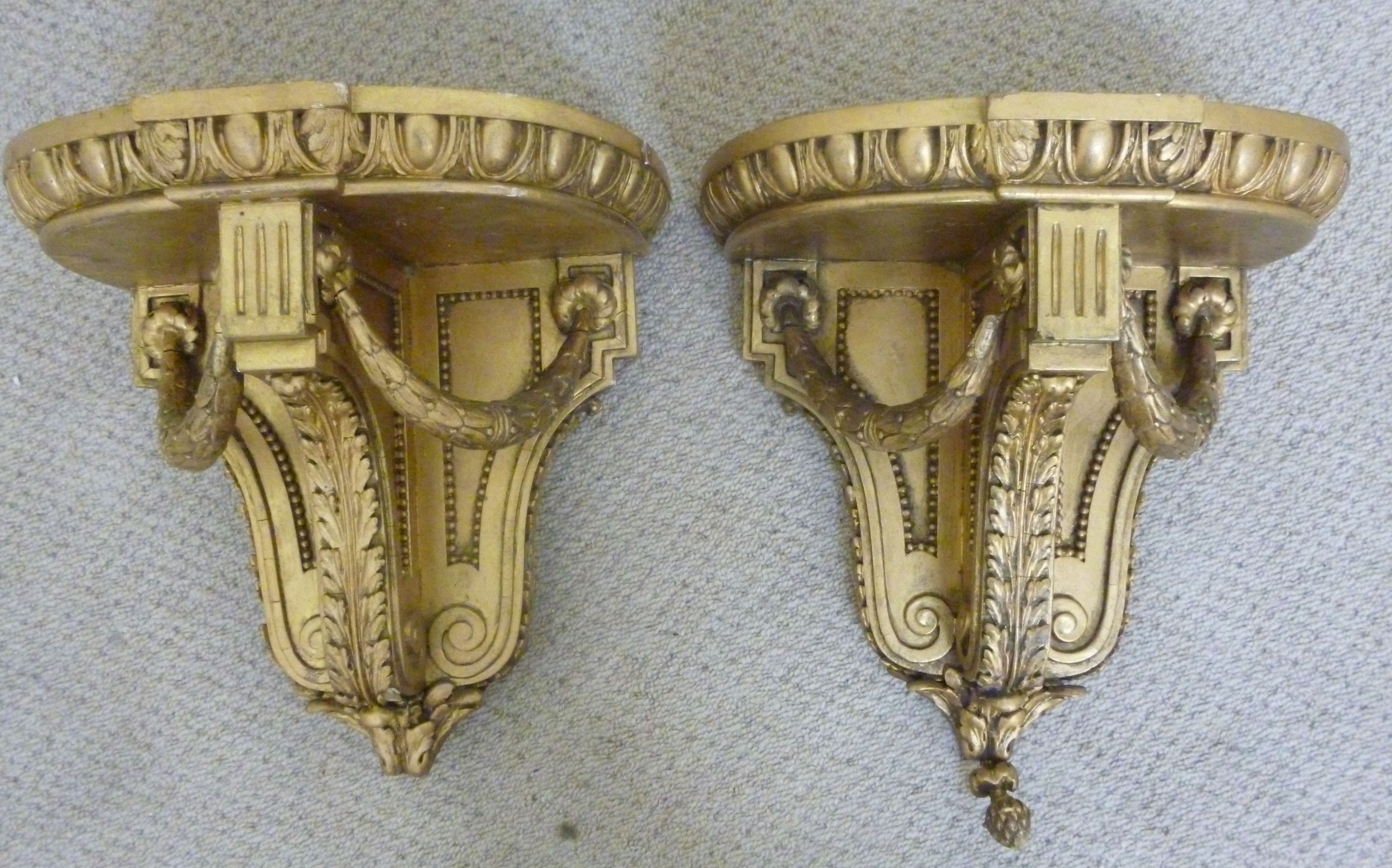 A pair of late 19thC gilt gesso wall bra