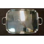 A silver rectangular serving tray with a