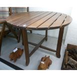 A modern stained beech folding garden ta