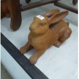 A cast iron model, a seated rabbit 8''h