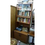 A G-Plan teak cabinet bookcase, having t