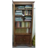 A modern yew finished cabinet bookcase,