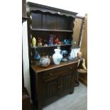 A modern oak Welsh dresser, having a two