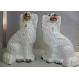 A pair of mid Victorian Staffordshire po