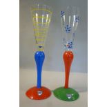 Two Orrefors 'clown' wine glasses, each