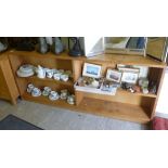 A modern pale oak bookcase with four she