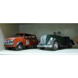 Two painted metal model cars: to include