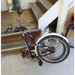 A Stowaway 3 folding bicycle with 16''wh