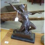 A cast and patinated bronze figure, a th