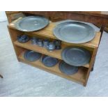 A modern pale oak bookcase with two shel