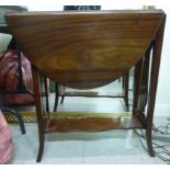 A 1930s mahogany Sutherland table, the o