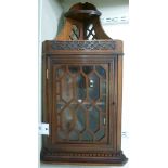 An Edwardian mahogany corner cabinet, ha