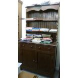 A modern stained oak dresser, having a t