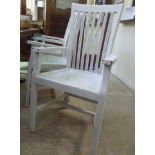 A set of four modern white painted teak