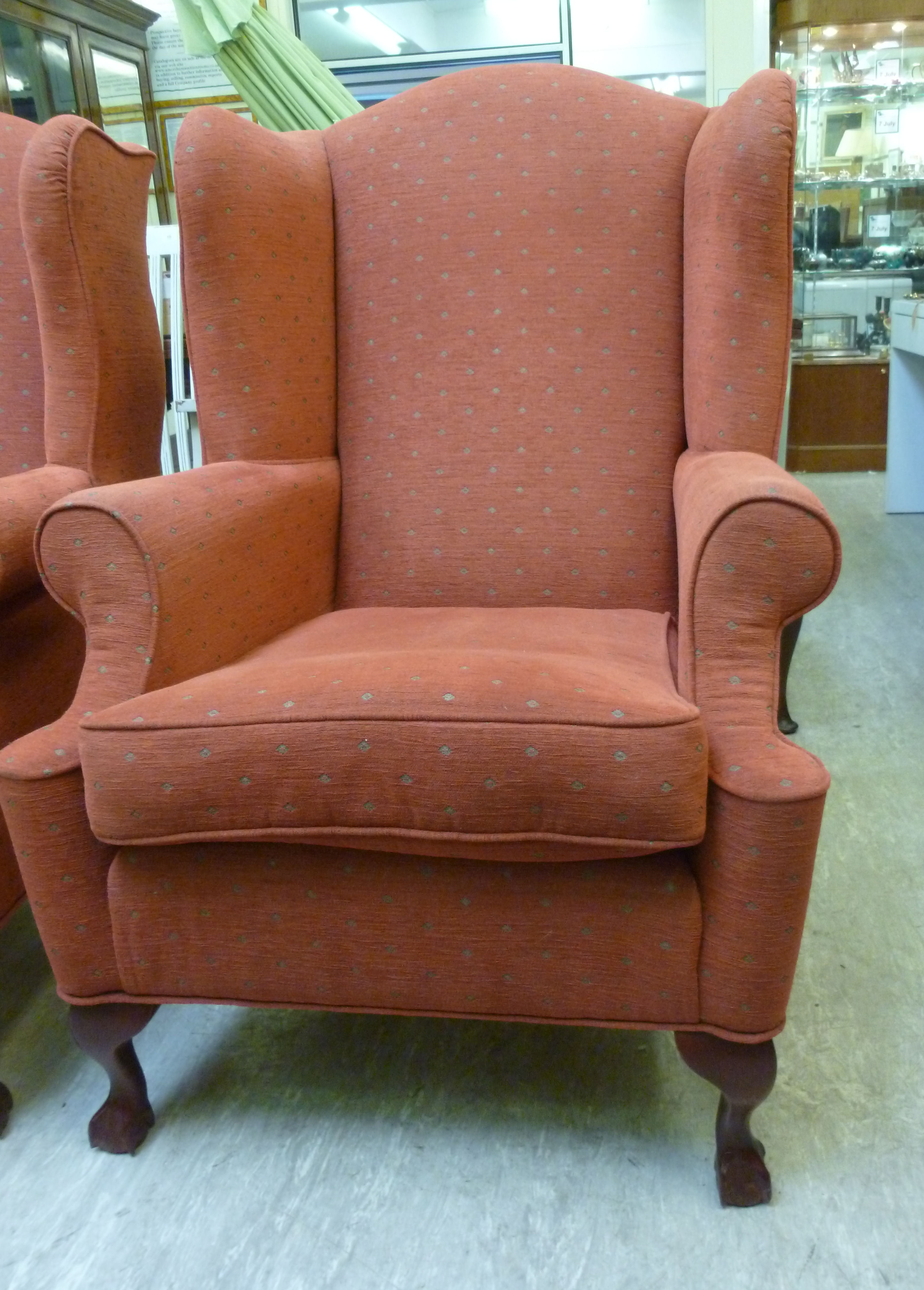 A mid Georgian style wingback armchair,