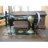 An early 20thC Jones treadle sewing mach