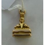 A 9ct gold locket seal with a pendant ri