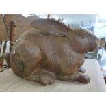 A cast iron model, a sitting rabbit 8''