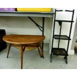 An Ercol beech and elm coffee table, the