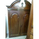 A George III mahogany cabinet, having a