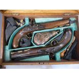 A pair of early 19thC flintlock pistols,