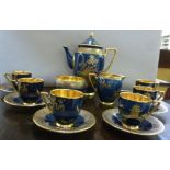 A Carlton Ware china coffee set, decorat