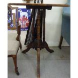 A late Victorian mahogany tip-top side t