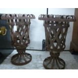 A pair of terrace rivetted wrought iron