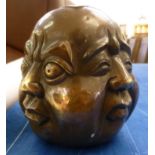 A brass four face Buddha's head 4.5''h