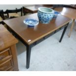 A mid 20thC office table, having a brown