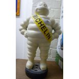 A painted cast iron model Michelin Man,