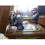 A Frister & Rossman manual sewing machin