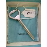 A Tiffany & Co silver coloured metal cro