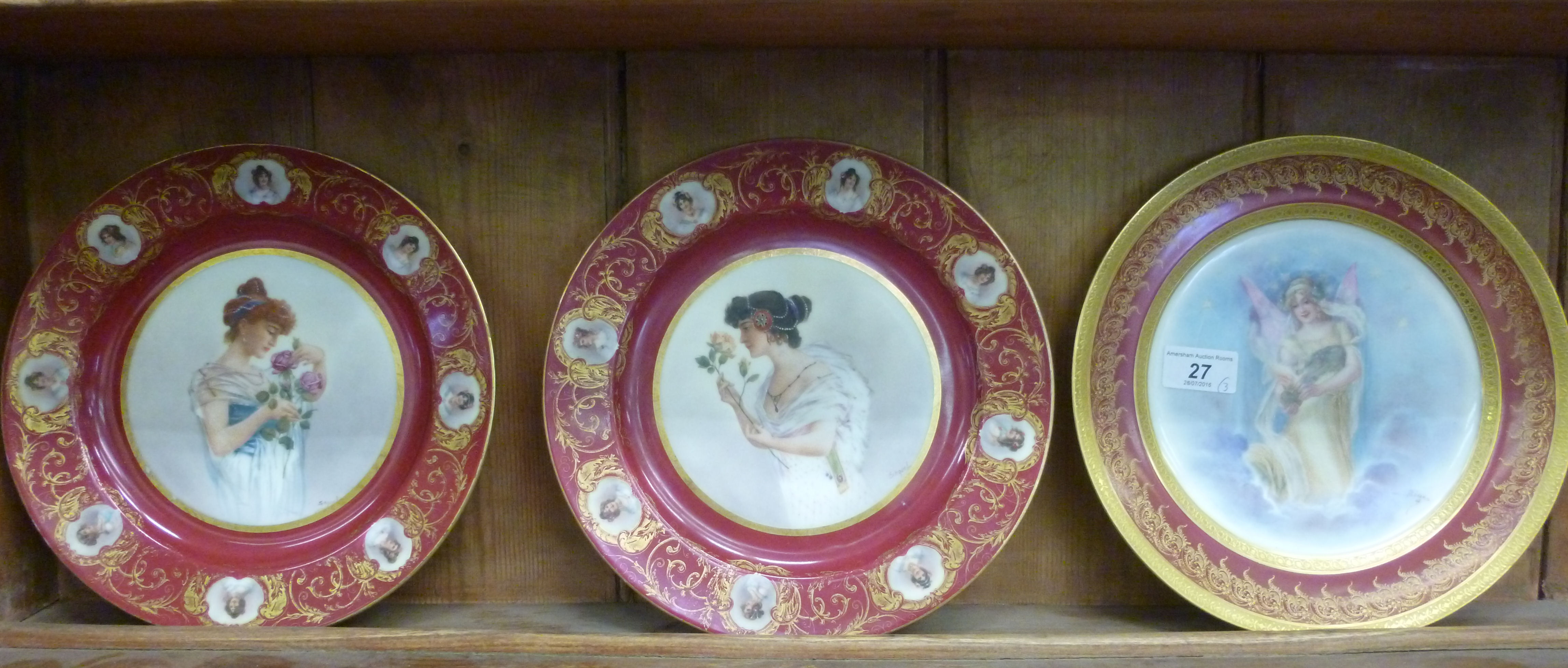 A pair of Limoges porcelain plates, deco