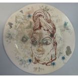 A Stephen Dixon painted pottery plate, featuring a female portrait,