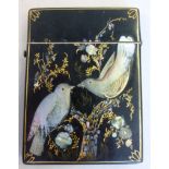 An early 20thC black lacquered and gilded card case, the hinged cap on a button clasp,