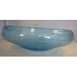 A bubbled, tinted blue Art Glass shallow bowl with an inverted rim 12.