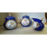 An early 20thC Sevres porcelain three piece tea set comprising a teapot of squat,